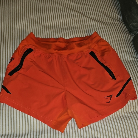 Gymshark Orange Shorts with Black Details - Picture 1 of 4